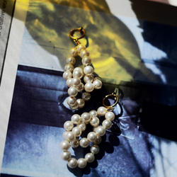 【非2023年7,8合刊】珍珠鞭耳環 第1張的照片