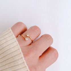 【14kgf／CZダイヤモンド】ケンタウルス座リング（フリーサイズ）指輪 ゴールド　華奢　シンプル　星 1枚目の画像