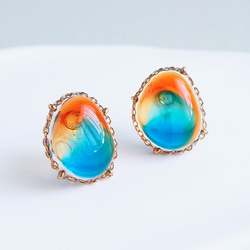 ブルーアンバーのような 宝石レジン] イヤリング/ピアス オレンジ 痛く
