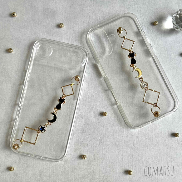 【全機種対応】夜空と猫 ハンドホルダー付きスマホケース ねこ好きさん ハンドベルト ストラップ付きスマホカバー 1枚目の画像