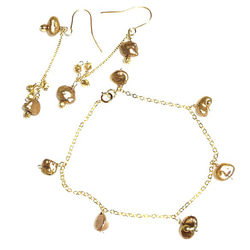 #119 ケシパール　本真珠　8㍉メタリックシャンパン　濃淡選べる　イヤリングピアス用　4枚（2ペア）シャンパンゴールド 2枚目の画像