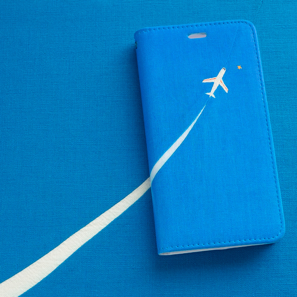 ひこうきぐも 手帳型スマホケース ベルトなし  ✶ SE2 SE3 iPhone15 飛行機 星 青 秋 ブルー ✶ 1枚目の画像