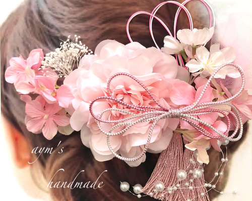 ピンク 花柄 着物。髪飾り。袴 6b61f3d77f13c791de0700815ff14d