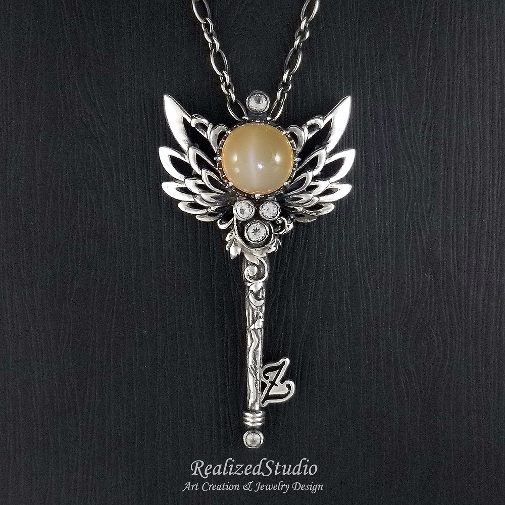 夢の翼 | 天使の羽キーペンダント - メロンオレンジムーンストーンキャッツアイ.S925 スターリングシルバー