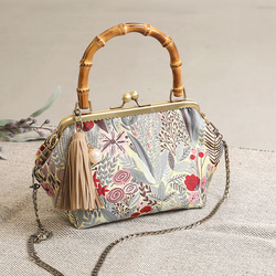 妖精の森「イエロー」バンブーハンドルフレームクラッチポーチ 1枚目の画像