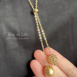 Key of Life▶︎上品 ラリエット 透かしボール×コットンパール ゴールドチェーン 70cm Y字ネックレス 9枚目の画像
