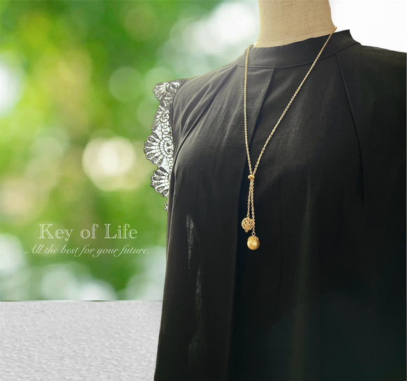 Key of Life▶︎上品 ラリエット 透かしボール×コットンパール ゴールドチェーン 70cm Y字ネックレス 6枚目の画像