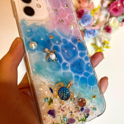 海からのプレゼント iPhone15 スマホカバー iPhone16スワロフスキースマホケース 幸せを呼ぶ オルゴナイト 7枚目の画像