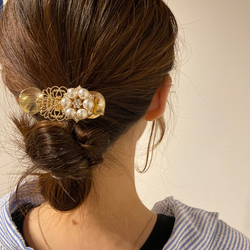 クリアゴールド リボン型ヘアクリップ ゴールドリボン型ヘアクリップセット - メルカリ