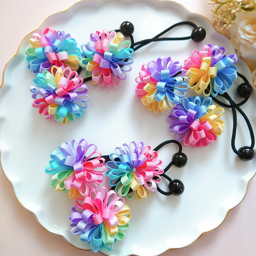 二個セット虹色たんぽぽリボン レインボーカラーが珍しい☆ ヘアゴム