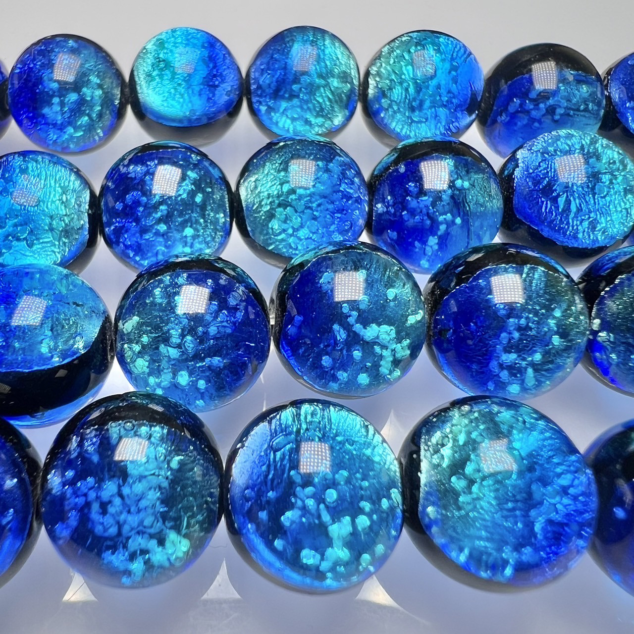 タケトミブルー 10mm 連売り 黒芯 蓄光 ホタルガラス 沖縄とんぼガラス とんぼ玉