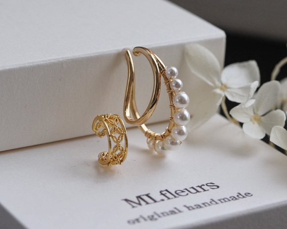 2 件套珍珠線和蕾絲圖案戒指耳夾 第2張的照片