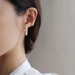 2 件套珍珠線和蕾絲圖案戒指耳夾 第1張的照片