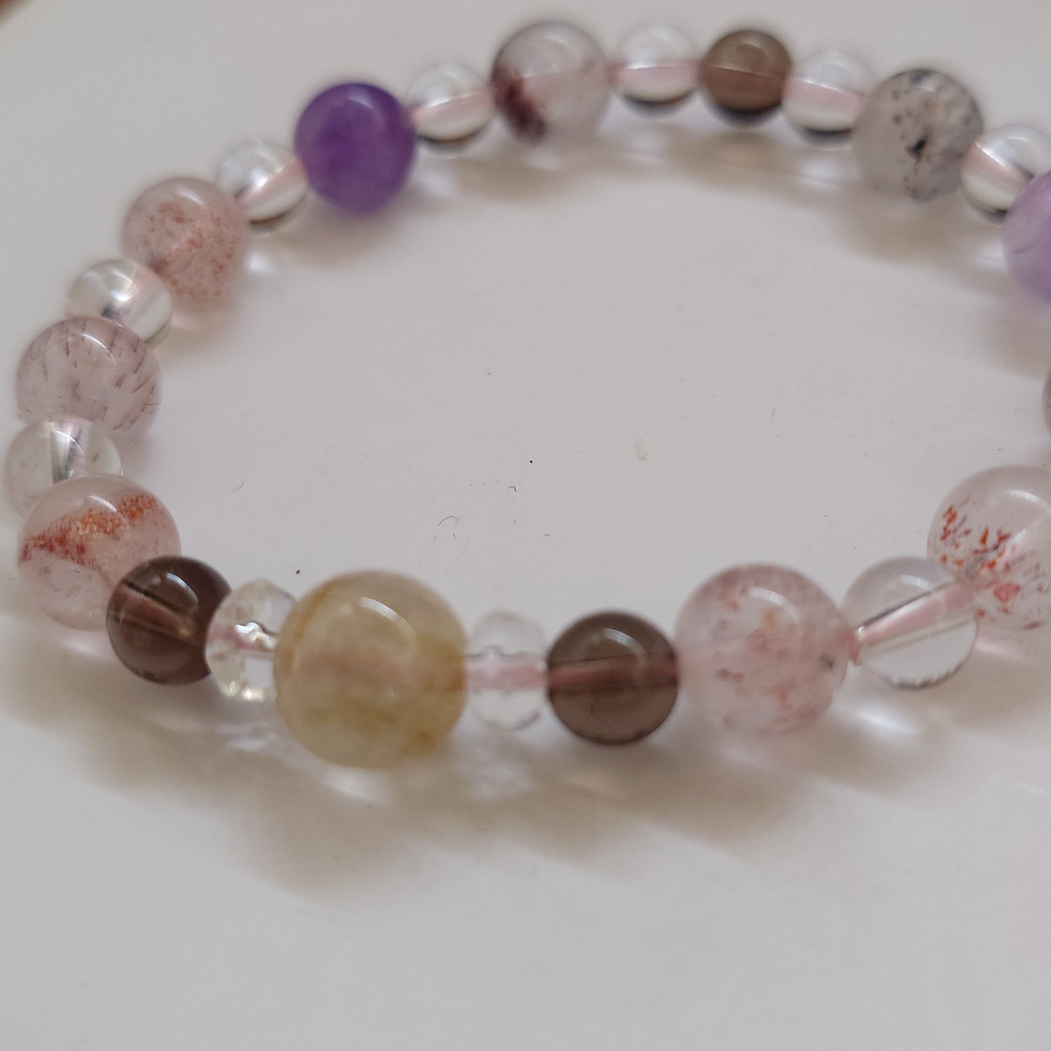 ～オールマイティーなセイクリッドセブンとルチルクォーツ、スモーキークォーツ、水晶のブレスレット～