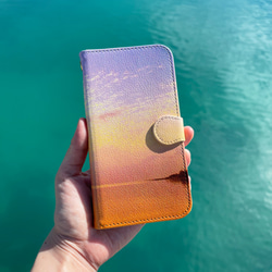 太陽護身符筆記本型智能手機保護殼 [兼容所有 iPhone/Android 型號] 第5張的照片