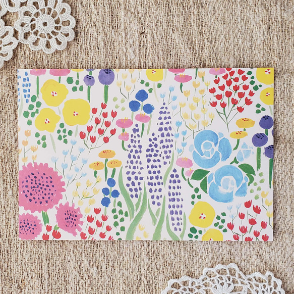 ポストカード「お花畑」 3枚入　カラフルなお花がいっぱいなイラスト 1枚目の画像