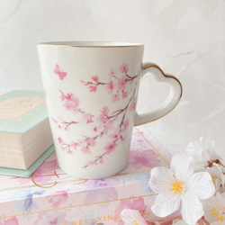 桜と蝶のくすみピンクマグカップ 1枚目の画像