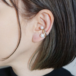 找到一枚鑲嵌珍珠的黃銅耳夾 第4張的照片