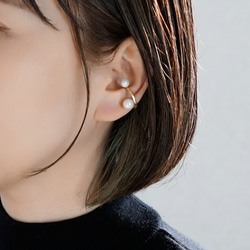 找到一枚鑲嵌珍珠的黃銅耳夾 第2張的照片