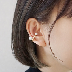 找到一枚鑲嵌珍珠的黃銅耳夾 第3張的照片