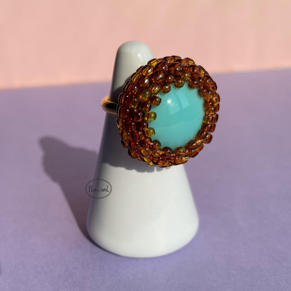 チェコガラスカボションのリング　指輪　丸　ターコイズブルー　ブラウン 1枚目の画像