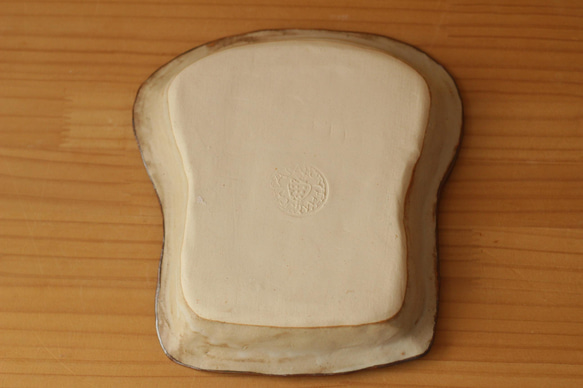 吃麵包的熊貓的麵包形狀的焗菜。 第4張的照片