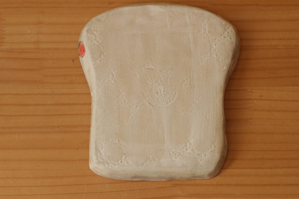 吃麵包粉的熊貓麵包盤。 第3張的照片