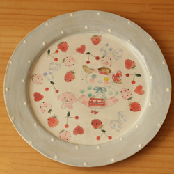 粉藍色圓點時尚貓和粉紅色 mofumo 蓬鬆輪輞板。 第3張的照片