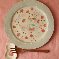 粉藍色圓點時尚貓和粉紅色 mofumo 蓬鬆輪輞板。 第7張的照片