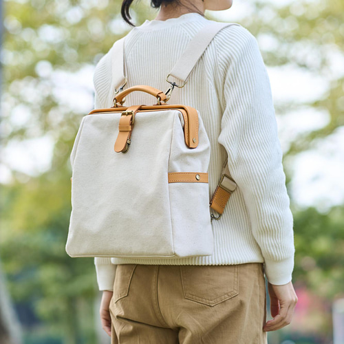 帆布×革の組み合わせ」口枠リュック フラットタイプのがま口 帆布×革の組み合わせ」口枠リュック フラットタイプのがま口
