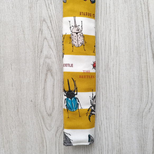 昆虫が大好きな子にぴったりな水筒肩ひもカバー　ロングタイプ　カブトムシ　クワガタ　コーカサスオオカブト♡　イエロー 3枚目の画像