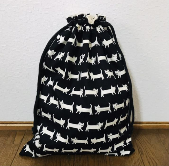 【再販】ニャンコボーダーのお着替え袋 1枚目の画像