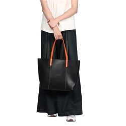 義大利真皮手提包，男女通用，時尚輕便，採用真牛皮製成，黑色，商務風格 第12張的照片