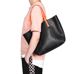 義大利真皮手提包，男女通用，時尚輕便，採用真牛皮製成，黑色，商務風格 第15張的照片