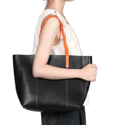 義大利真皮手提包，男女通用，時尚輕便，採用真牛皮製成，黑色，商務風格 第13張的照片