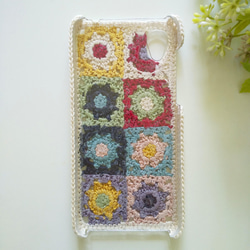 【受注製作】小花モチーフつなぎの手編みスマホケース（カラフル） 5枚目の画像