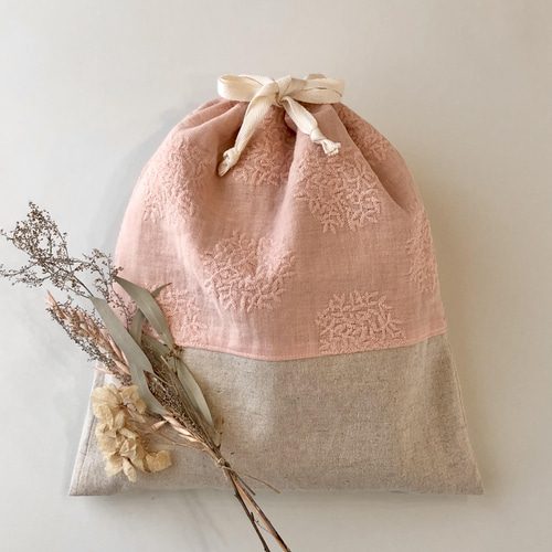 人気❤︎お着替え巾着袋 撥水裏地付き☆お花の刺繍ガーゼ お