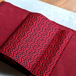 手織り博多織　帯「ナシラズ(赤竜）」赤と黒の個性的な柄のおしゃれ帯 4枚目の画像