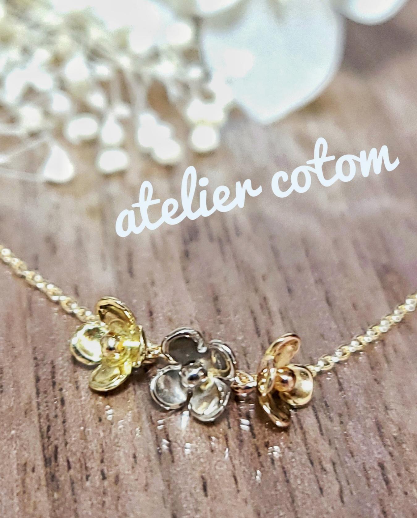 小さなお花のK10ペンダント