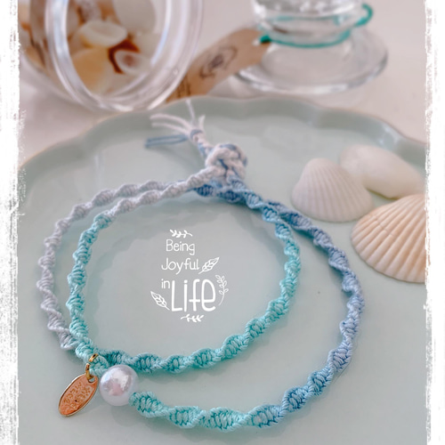 海のようなアクアミントグリーンのグラデーションが綺麗な 一粒の