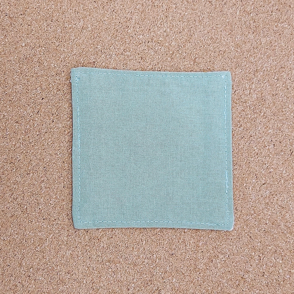 刺し子のコースター　麻の葉　濃紺　黄土色×緑 2枚目の画像