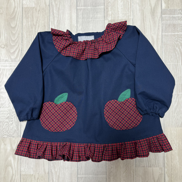 80～130尺寸 蘋果口袋格紋紅領下擺荷葉邊長袖罩衫 第10張的照片