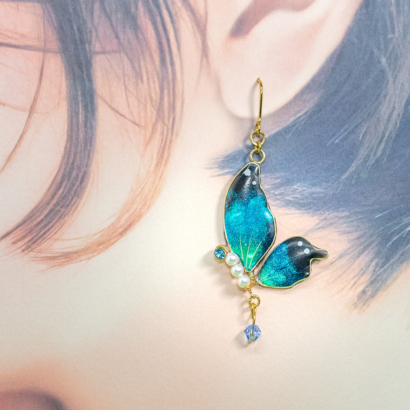 藍綠幻彩螢光手工金屬線半蝴蝶耳環 第2張的照片