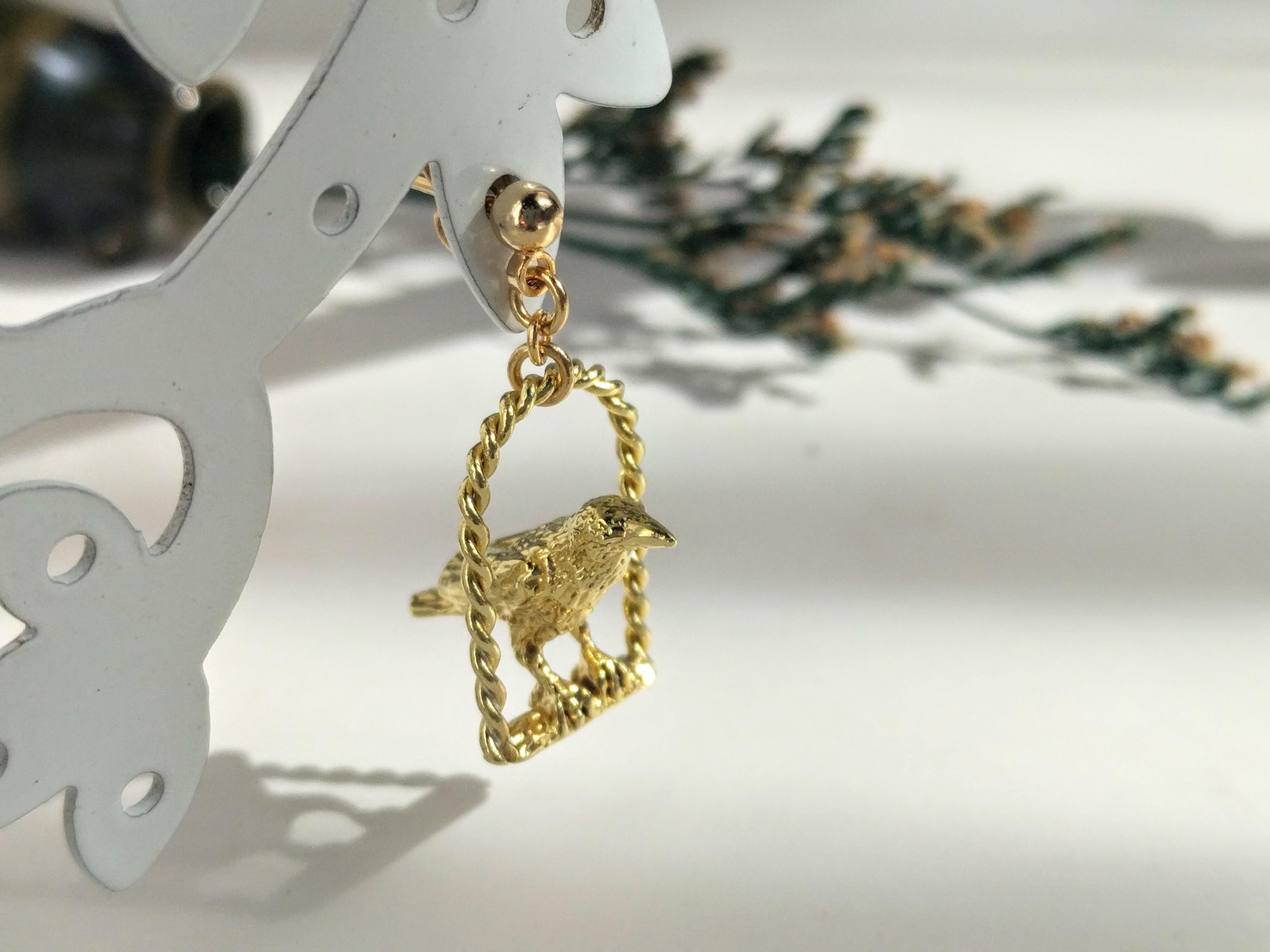 賢い鳥の片耳飾り＊真鍮