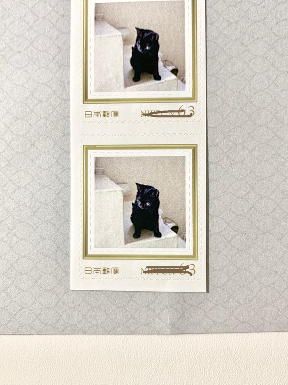 黒猫ポストカードと切手のセット 1枚目の画像