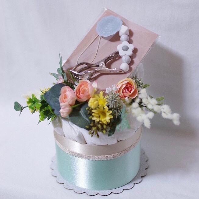 シューズクリッパーとスワッグのダイパーケーキ