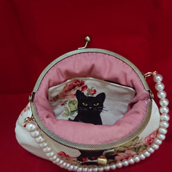 浪漫黑貓口金包圓扁包 第3張的照片