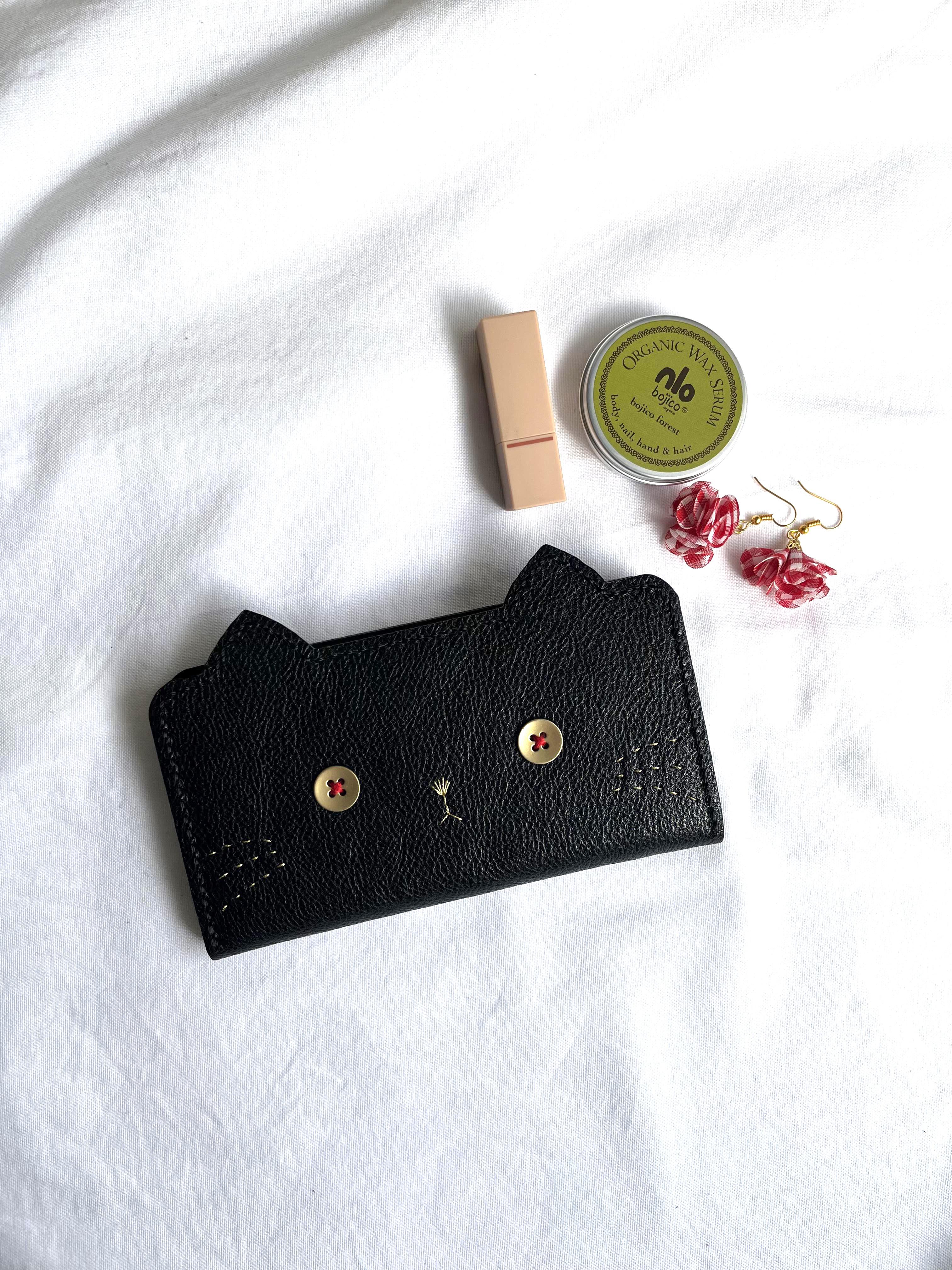 【受注制作】ねこのお顔　ボタン瞳ver.手帳型スマホケース 牛ソフトヌメ革 黒猫  全機種対応 5,168円