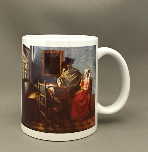 フェルメール 紳士とワインを飲む女 マグカップ 1枚目の画像