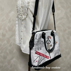 ラストです！フランスジャガード織り　パリジェンヌ・モニュメント柄使用の軽量外ポケット付きカパッと開閉ボストンバッグ 8枚目の画像